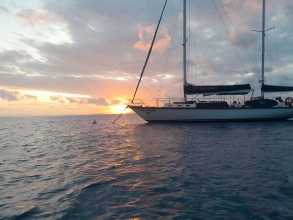 Waltzing Matilda at anchor at sunset in the Whitsundays